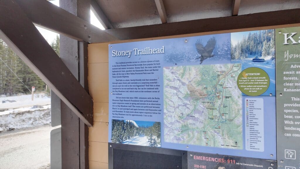 A notice board at Troll Falls Parking Traihead introducing Stoney Trailhead and Kananaskis Country