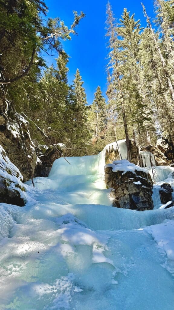 Completely multi-layered frozen upper falls at the end of Troll Falls Trail Kananaskis
