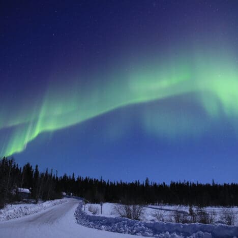 Aurora in Prelude Lake, a popular aurora viewing location close to Yellowknife