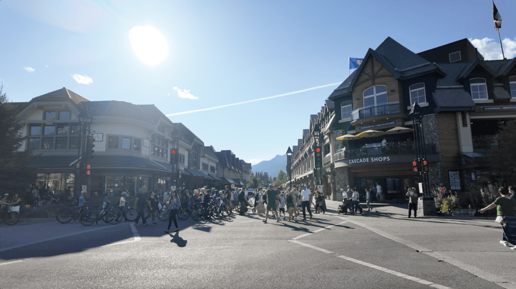 People Crossing Banff Avenue in Banff National Park