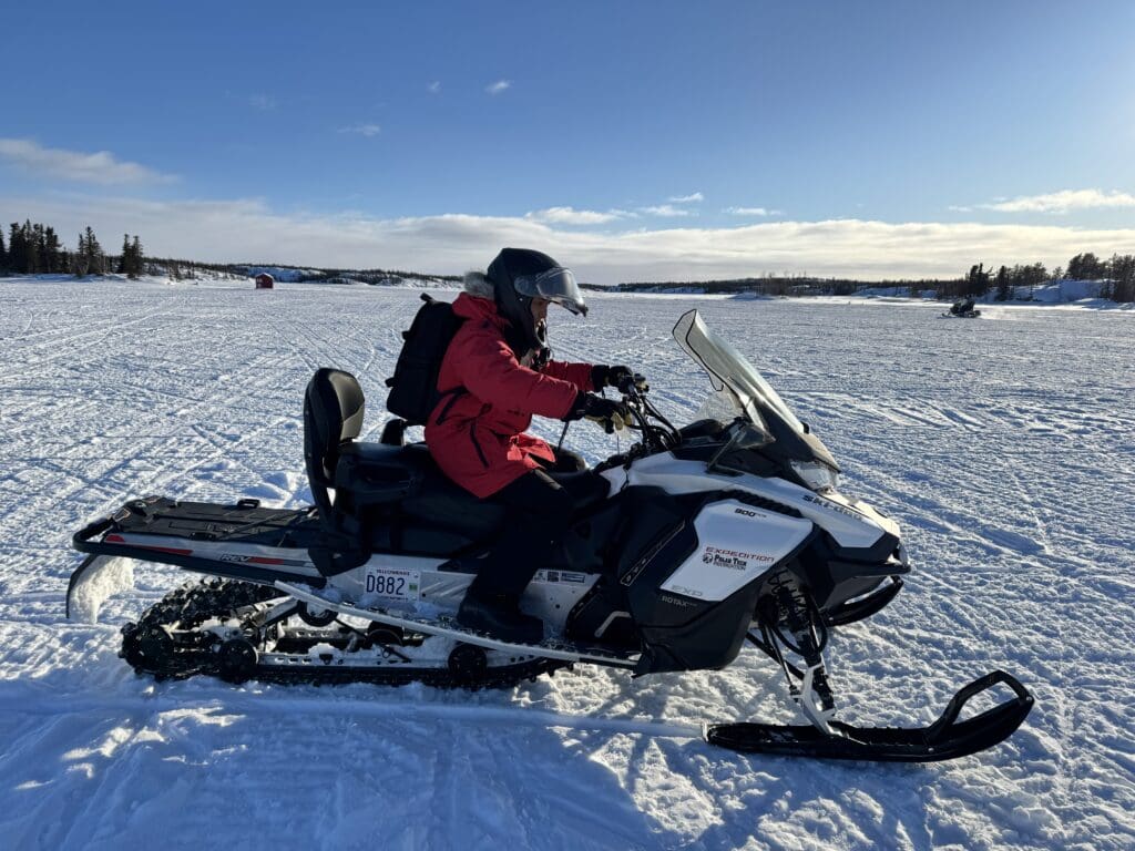 Riding on a snowmobile in Yellowknife