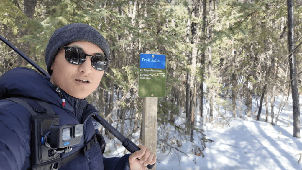 The Sign showing turn left to Upper Falls and turn right to parking via Troll Falls Loop