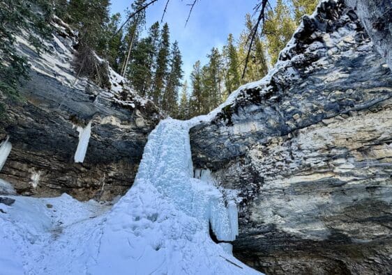 Frozen Troll Falls Kananaskis with a huge icefall in the middle of limestone