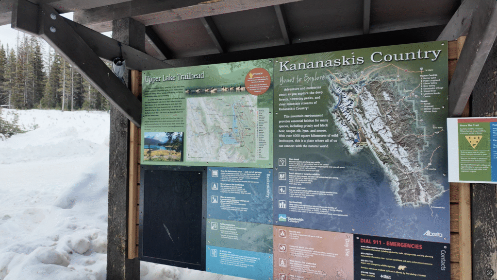 The notice board at Upper Kananaskis Lake Trailhead introducing Upper Lake Trailhead and different hiking trails close by