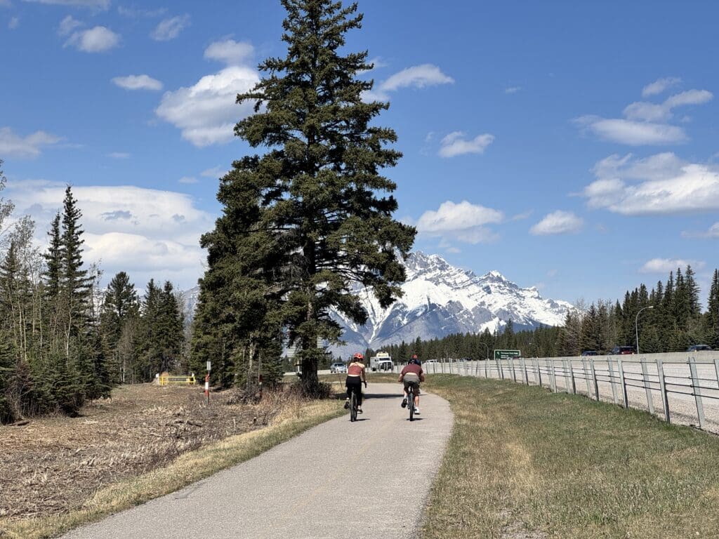 Scenic biking trail next to Trans-Canada Highway facing Cascade Mountain in Banff National Park